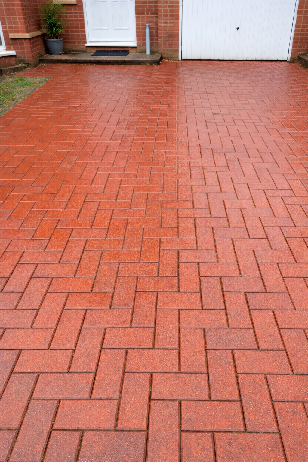 After - Freshly pressure washed driveway